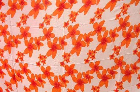 Orange flower print design on handcrafted batik summer shawl from import wholesale shopping boutique