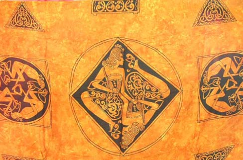 Indonesian art designs on orange bali shawl manufactured by wholesale distribution catalog company