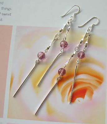Wholesale jewelry Cz trendy shopping sterling silver earrings with purple Cz dangles     