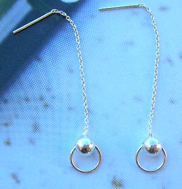 Fine fashion jewelry wholesale supplier sterling silver long earrings holding a silver bead loop  