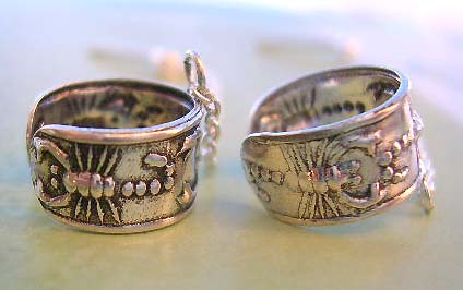 Fashion design sterling silver earrings spplier, carved out scopion pattern   