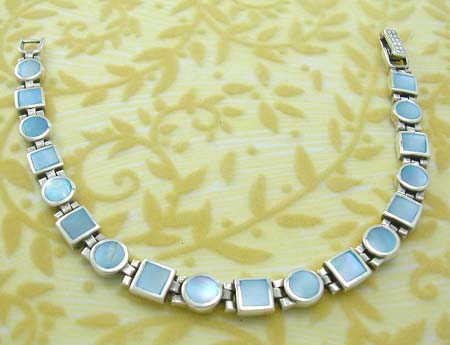 Sterling silver fashion pearl jewelry in bracelet with multi square adn rounded shape with blue mother of pearl inlay 