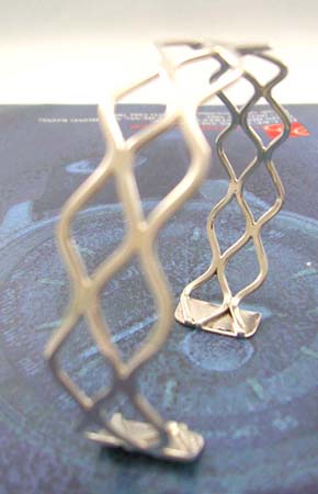 Designer fashion jewelry online wholesale supply sterling silver bangle in three wavy pattern design    