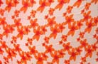 Orange flower print design on handcrafted batik summer shawl from import wholesale shopping boutique