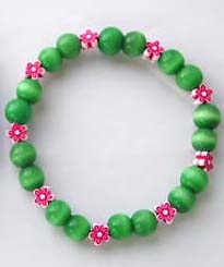 Wholesale gift shop wholesale -- Fashion cat-eye jewelry with light green cat-eye and little flower pattern                          
