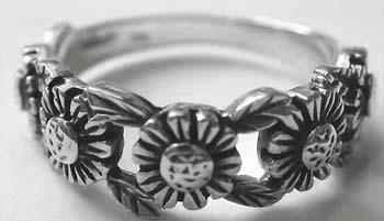 Silver ring gift shop wholesaler - 925. sterling silver ring with multi flower feature around                 